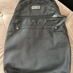 Tumi crossbody backpack can switch left or right side